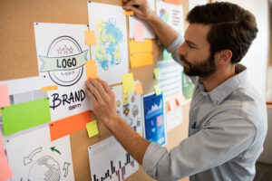 Side view of businessman analyzing chart in office